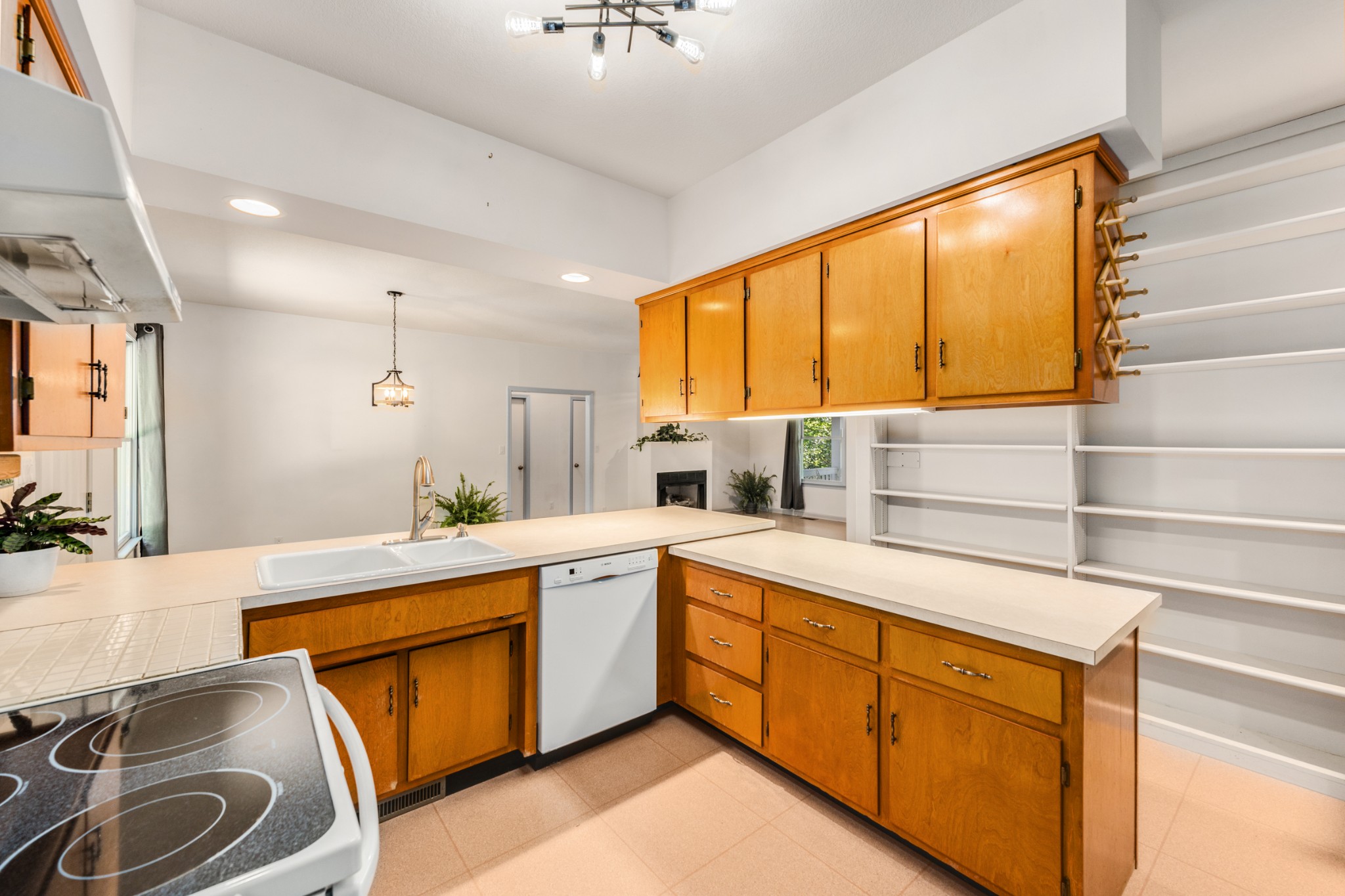 358 Harper Road Clarksville, TN 37043 - Photo 13 of 34 a kitchen with a sink stove and cabinets