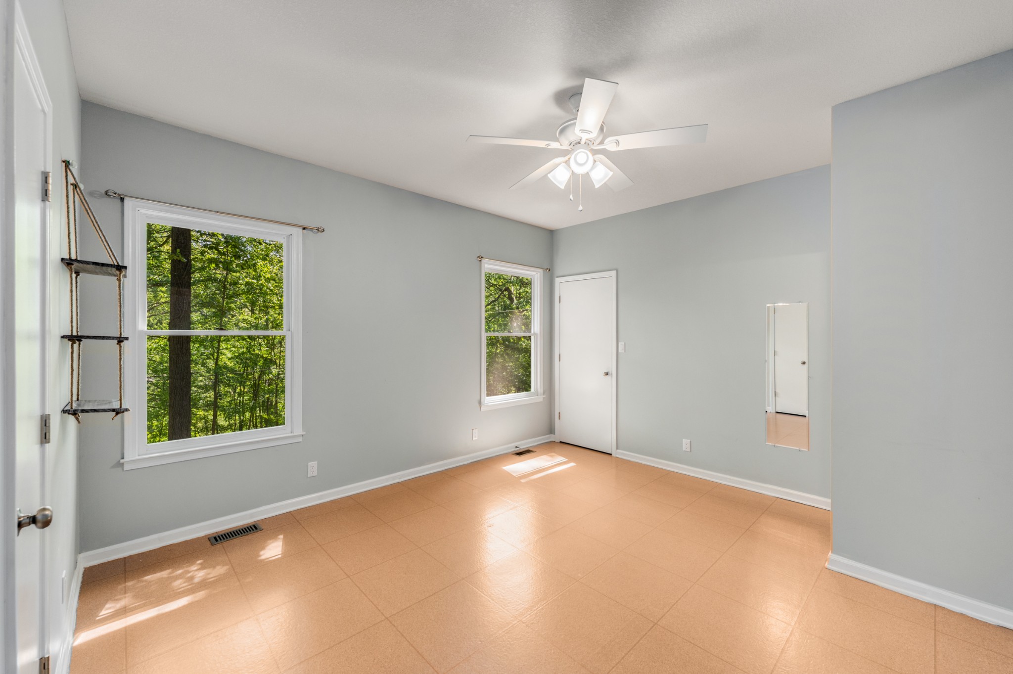 358 Harper Road Clarksville, TN 37043 - Photo 17 of 34 an empty room with windows and fan