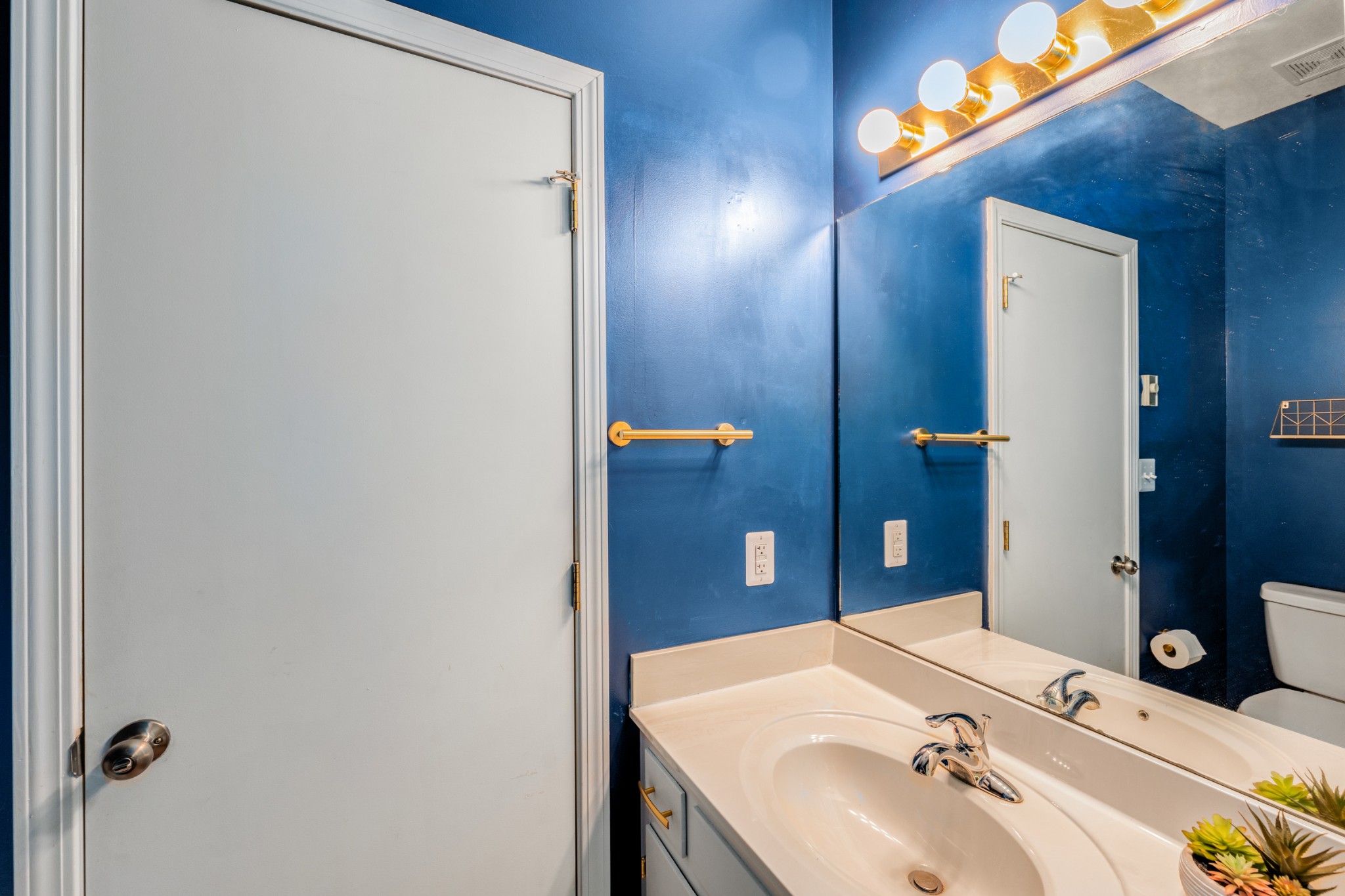 358 Harper Road Clarksville, TN 37043 - Photo 18 of 34 a bathroom with a sink and a mirror