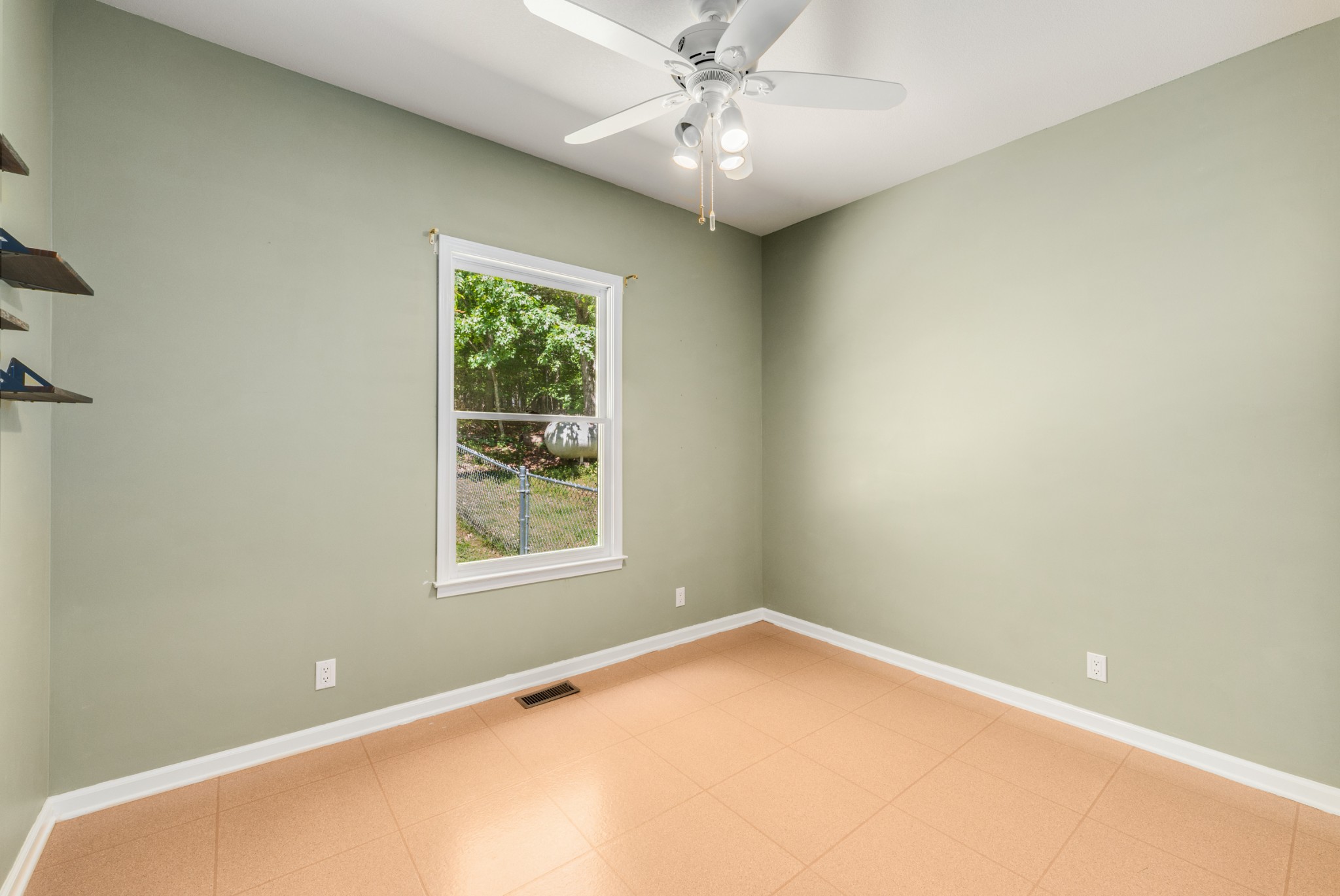 358 Harper Road Clarksville, TN 37043 - Photo 22 of 34 an empty room with a window
