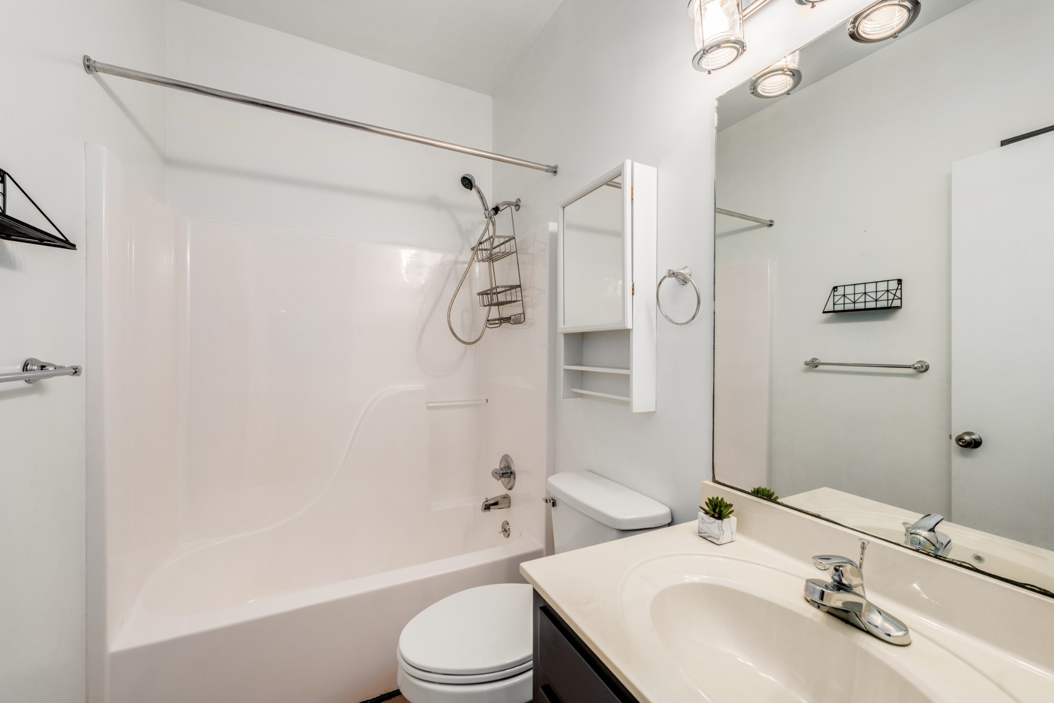 358 Harper Road Clarksville, TN 37043 - Photo 23 of 34 a bathroom with a sink toilet tub and shower