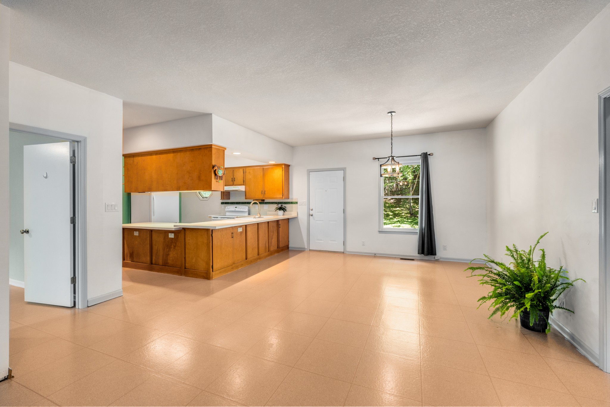 358 Harper Road Clarksville, TN 37043 - Photo 24 of 34 a view of a kitchen with microwave and refrigerator