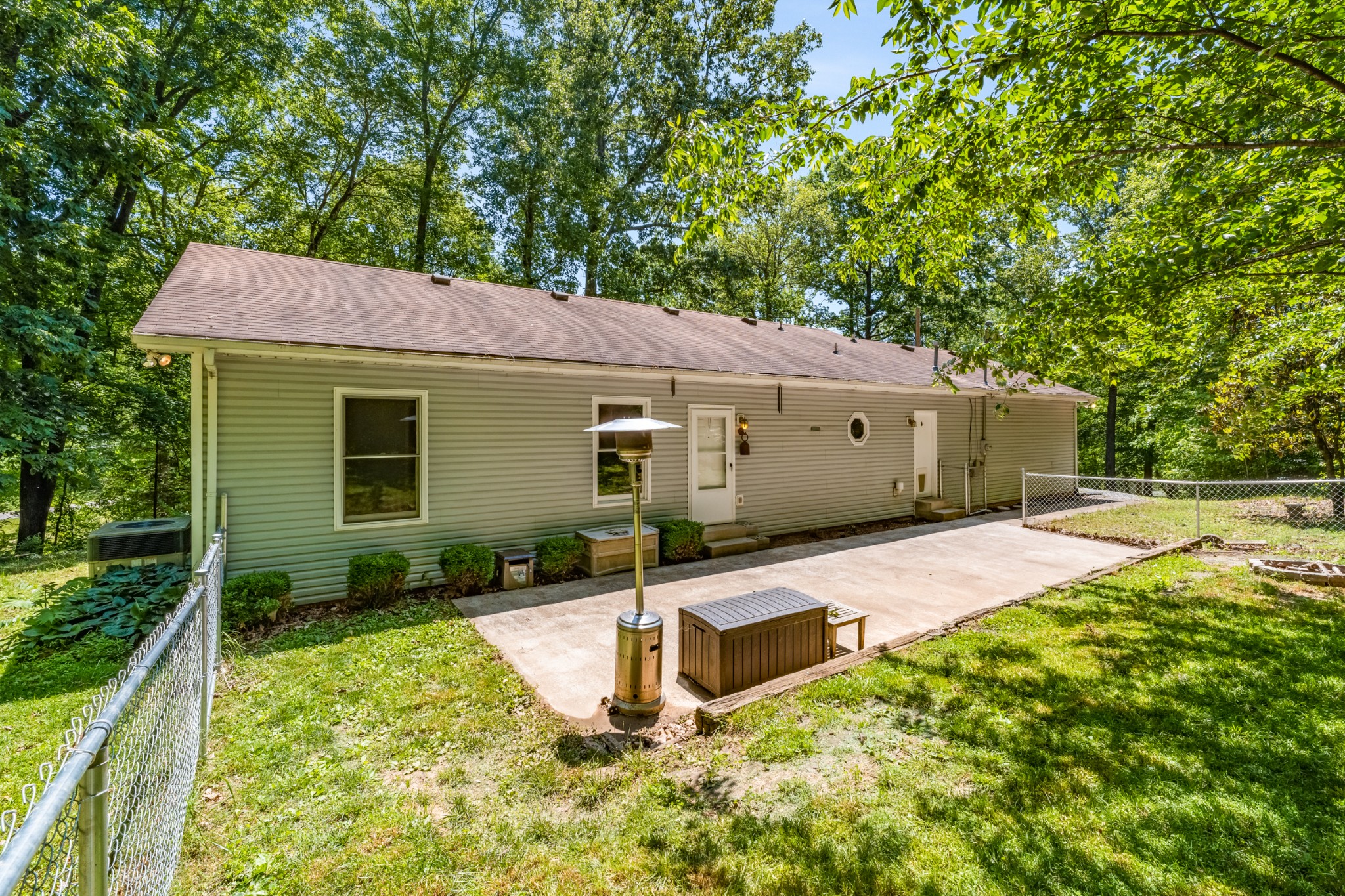 358 Harper Road Clarksville, TN 37043 - Photo 26 of 34 a view of a house with backyard and garden