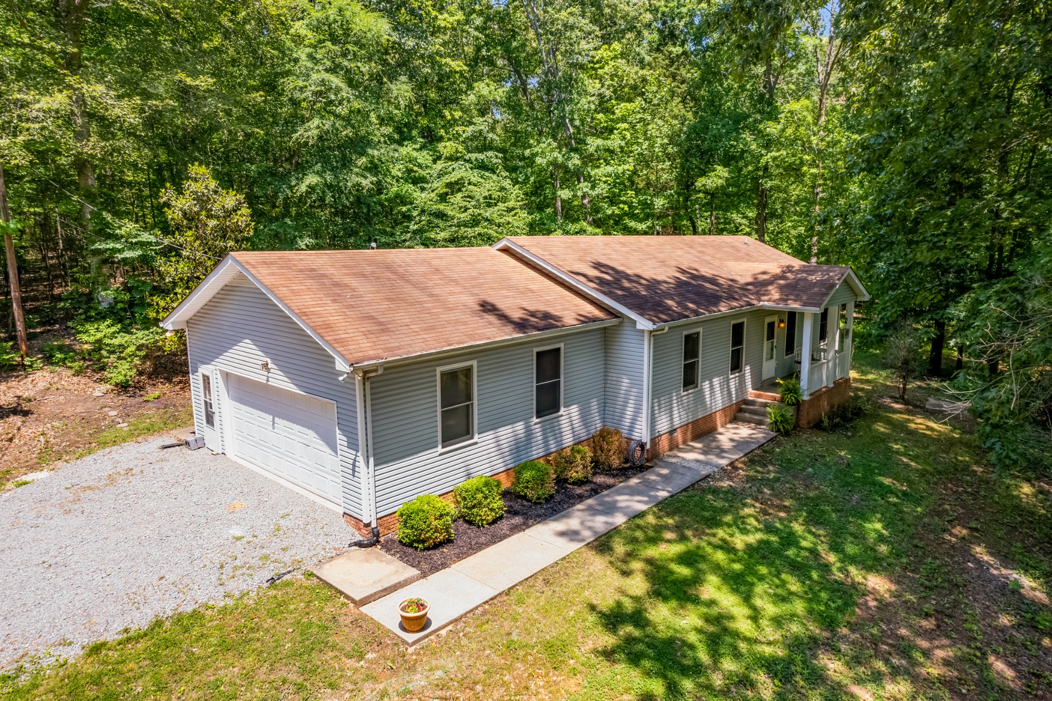 358 Harper Road Clarksville, TN 37043 - Photo 3 of 34 a view of a house with backyard and sitting area