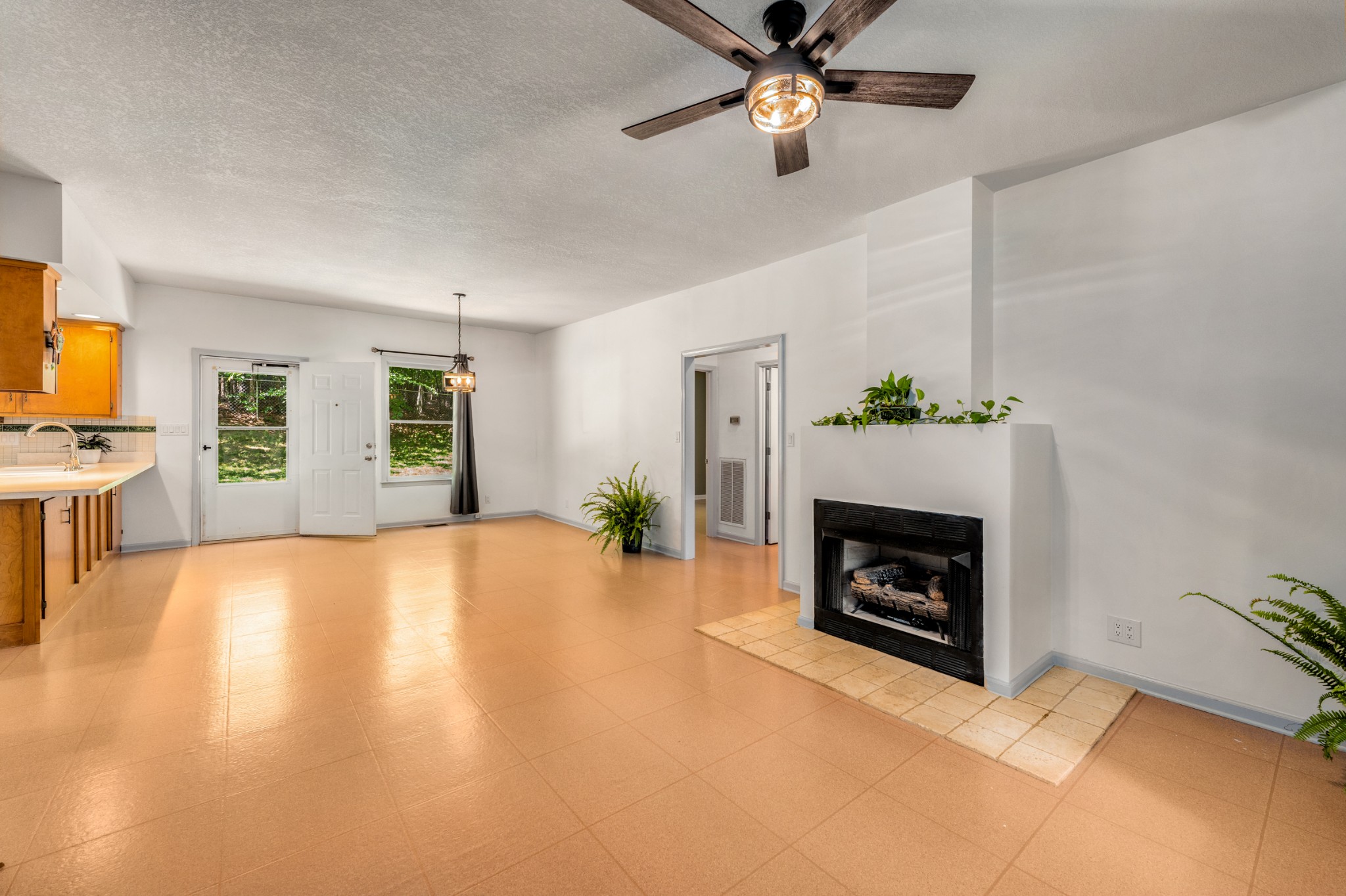358 Harper Road Clarksville, TN 37043 - Photo 7 of 34 a living room with furniture and a fireplace