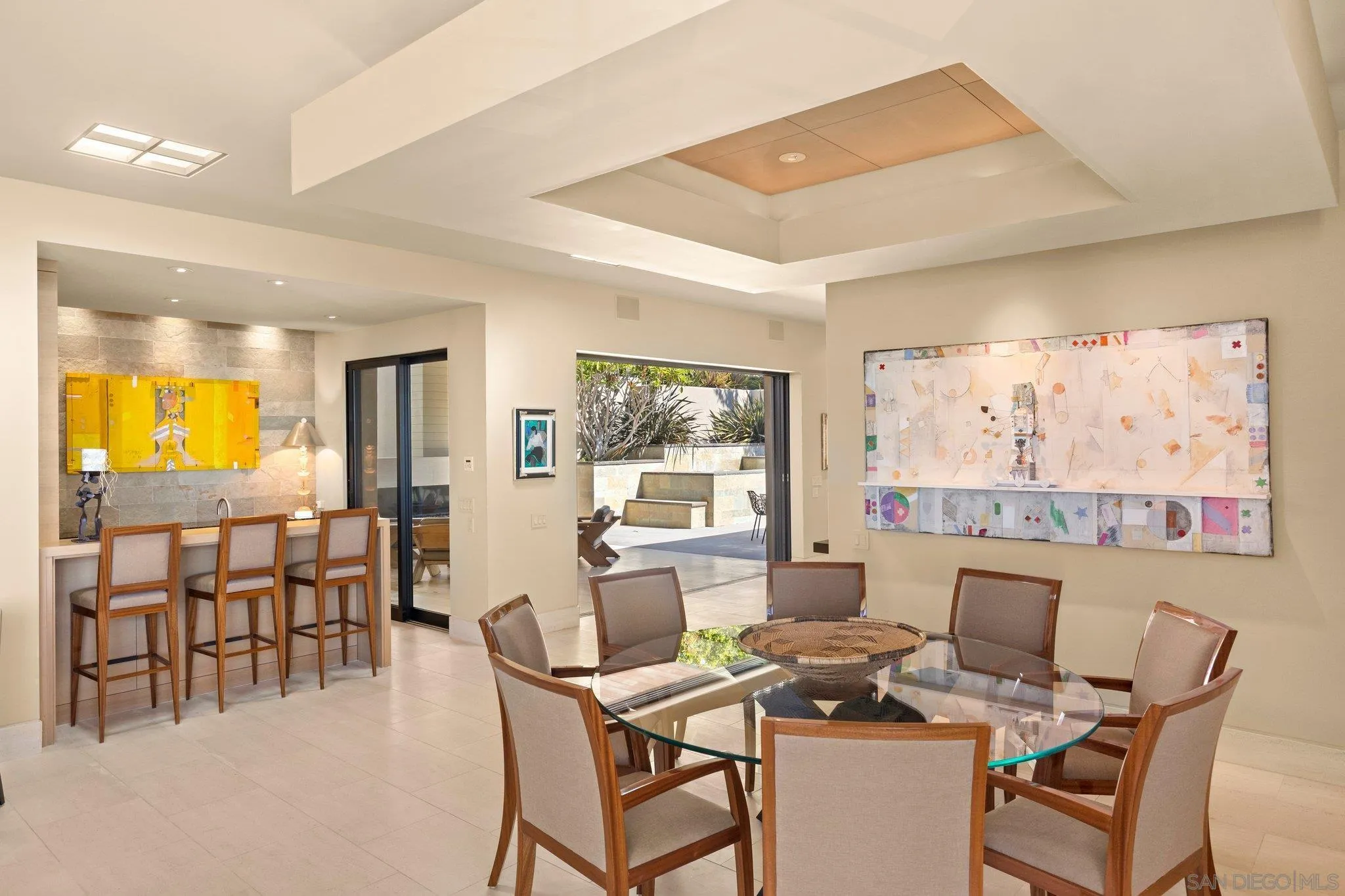 7413 Fairway Road La Jolla, CA 92037 - Photo 15 of 40 a view of a dining room with furniture window and outside view