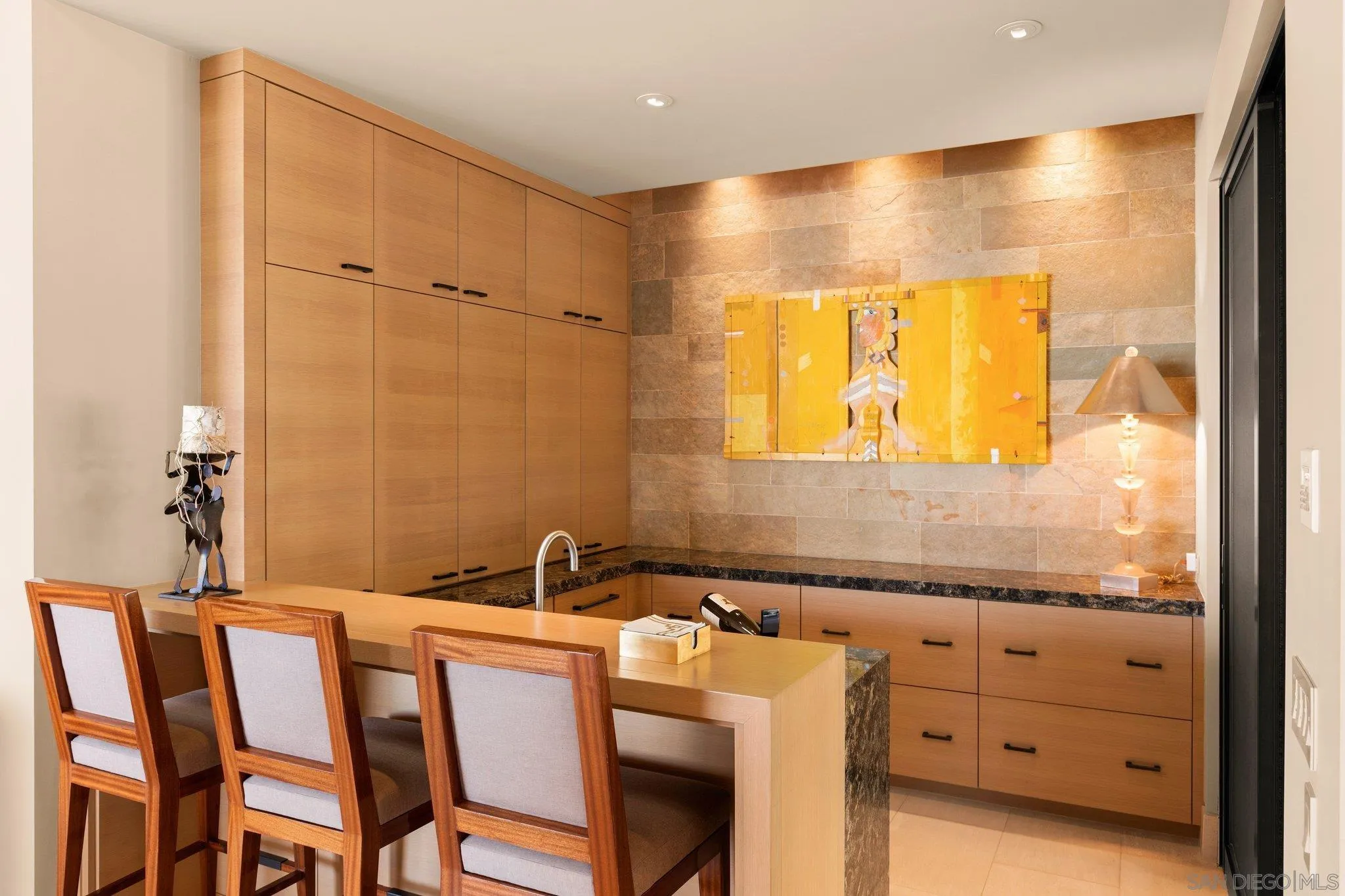 7413 Fairway Road La Jolla, CA 92037 - Photo 16 of 40 a bathroom with a sink and a mirror