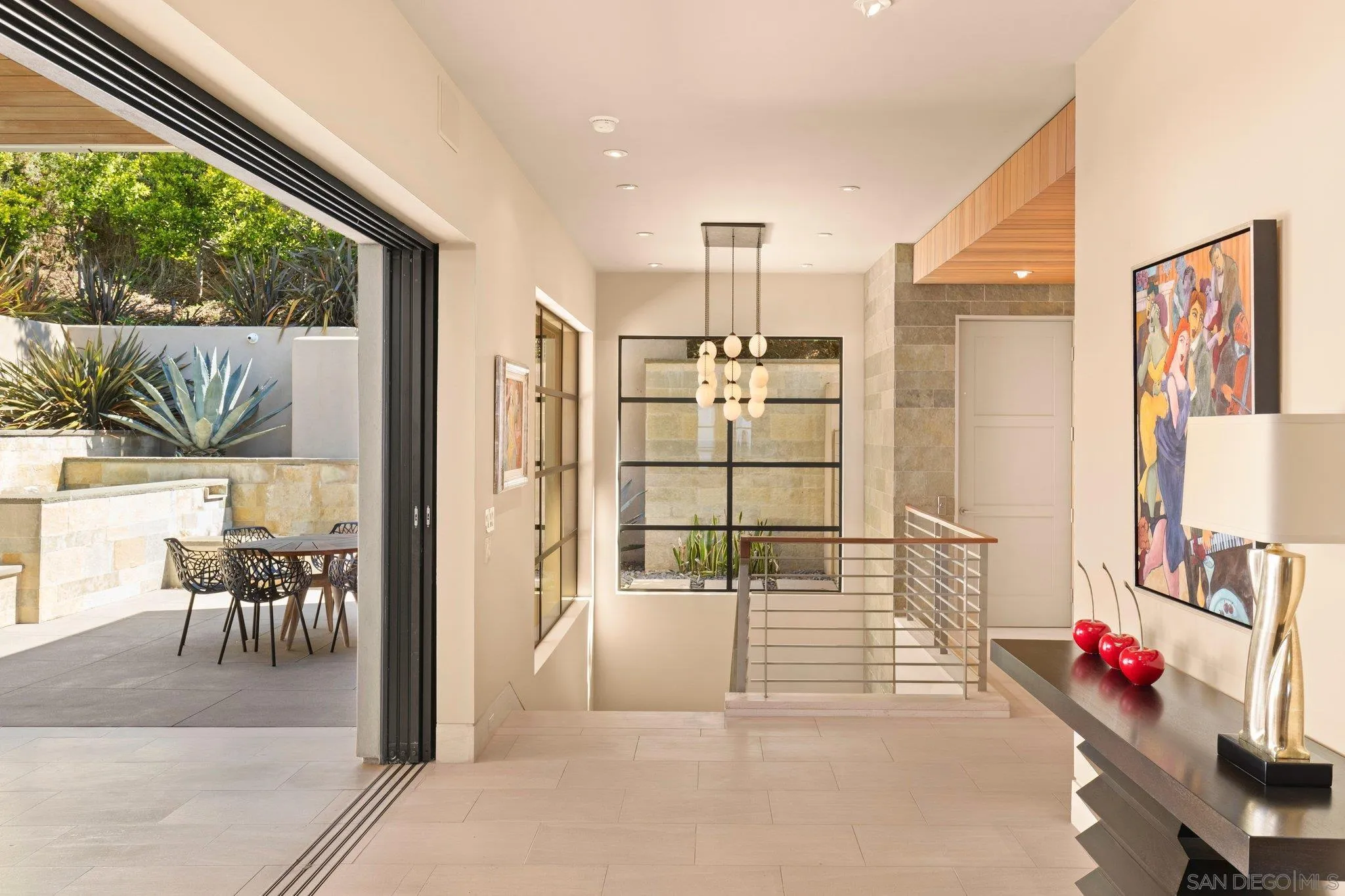 7413 Fairway Road La Jolla, CA 92037 - Photo 17 of 40 a room with furniture and a table