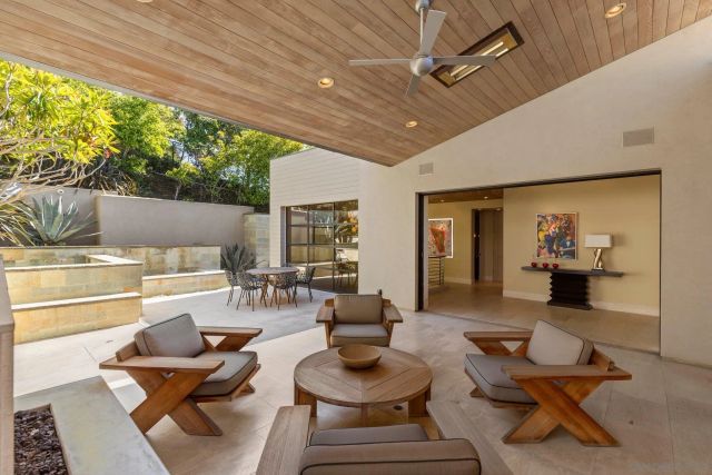 a very nice looking dining room with a table and chairs