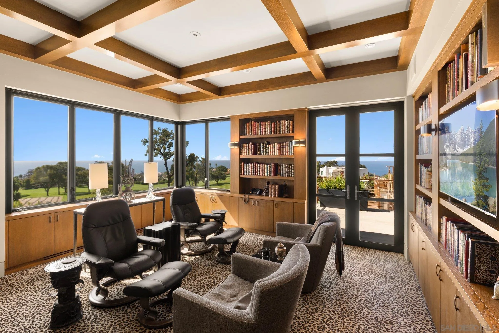 7413 Fairway Road La Jolla, CA 92037 - Photo 31 of 40 a living room with furniture a rug and a floor to ceiling window