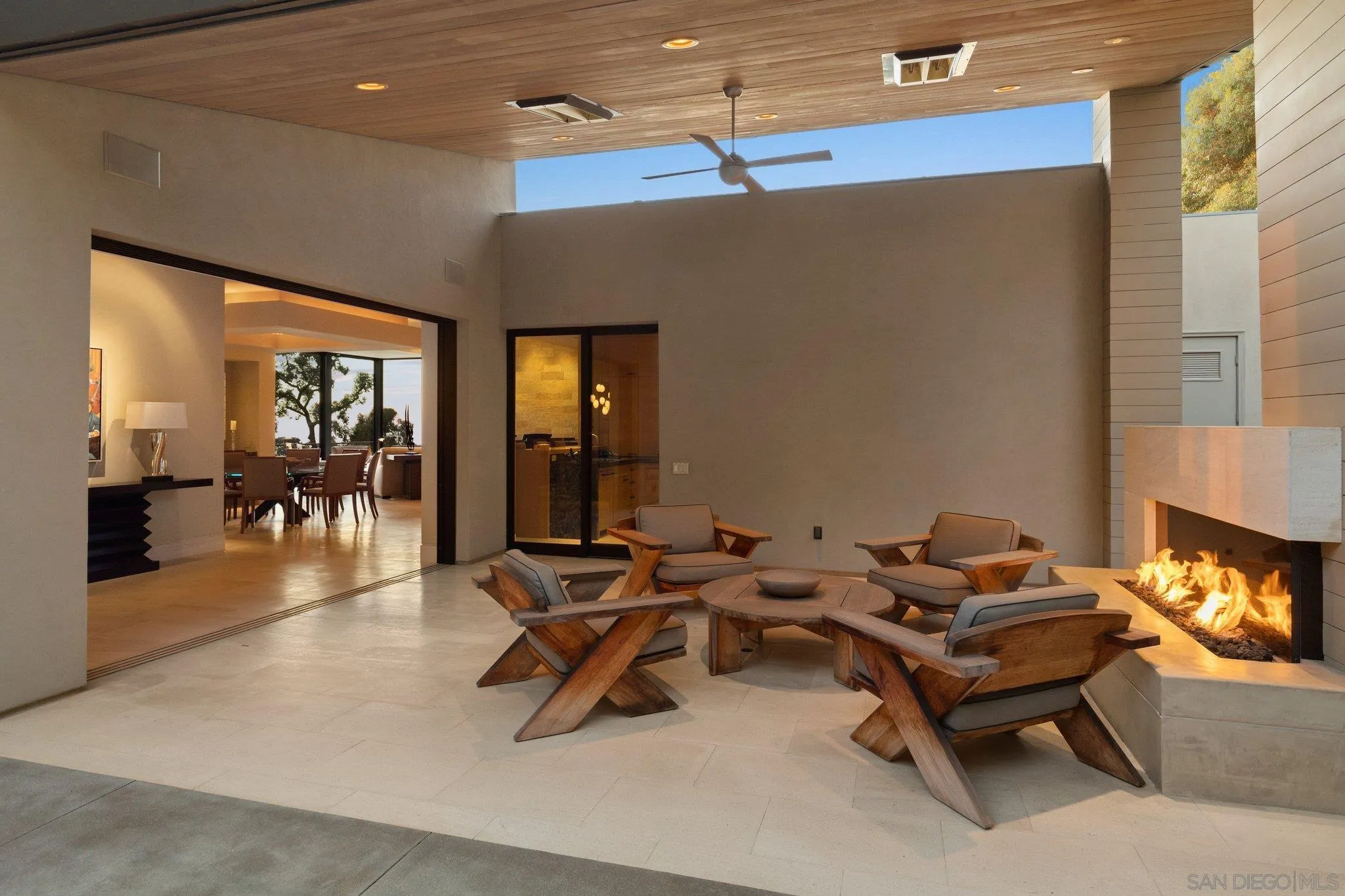 7413 Fairway Road La Jolla, CA 92037 - Photo 35 of 40 a living room with furniture a dining table and wooden floor