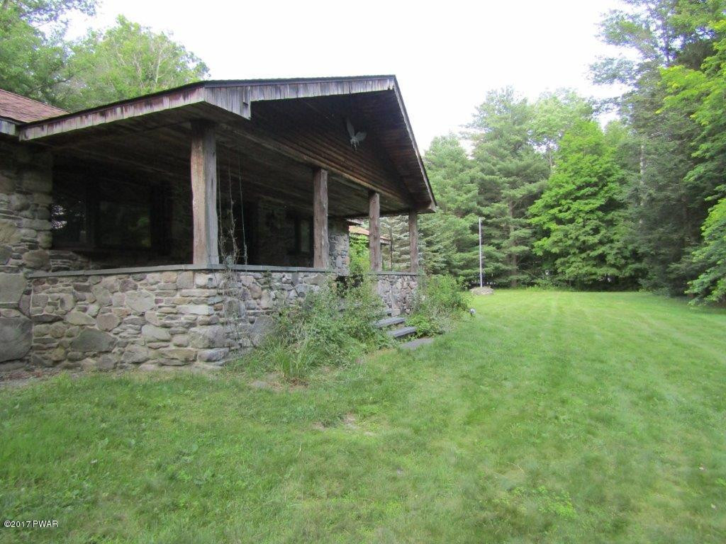 227 Hemlock Grove Road Newfoundland, PA 18445 - Photo 4 of 49 a view of house with backyard