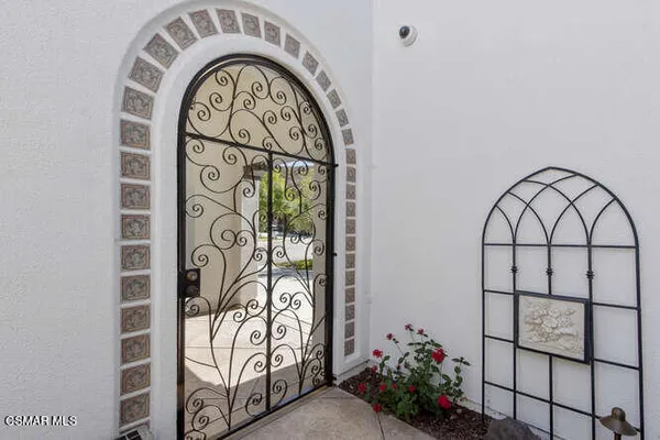a view of door with wooden floor