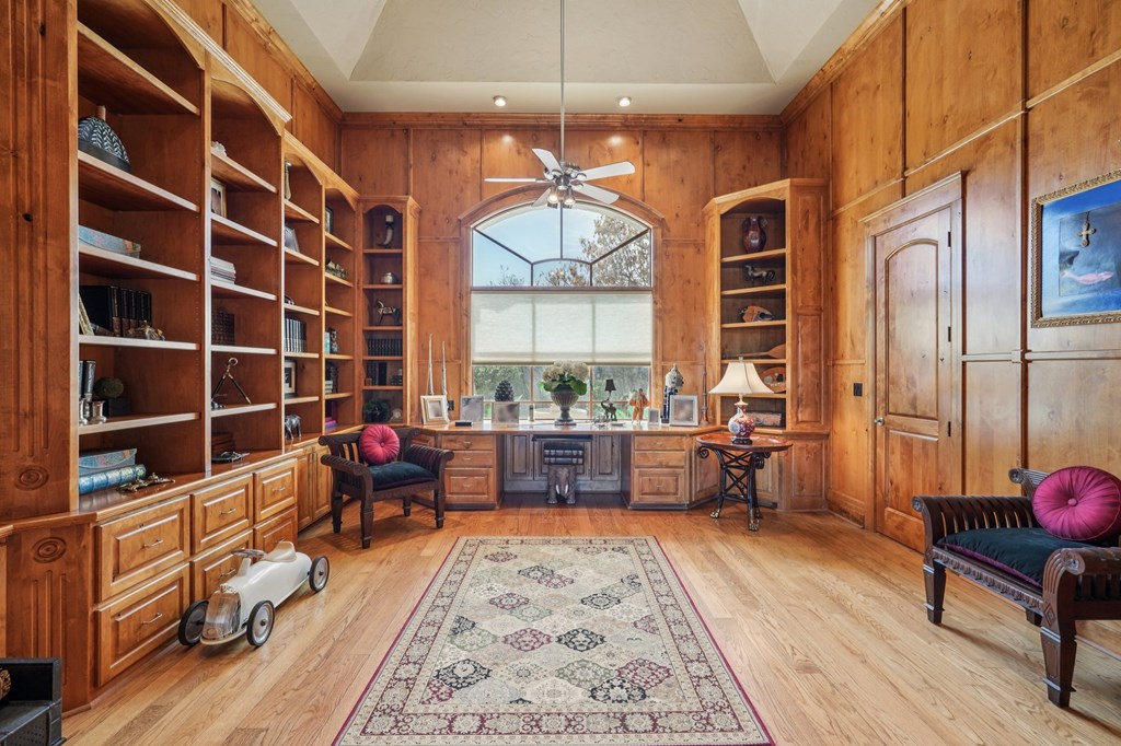 2121 Landmark Kerrville, TX 78028 - Photo 13 of 108 a living room with furniture a rug a chandelier and a window