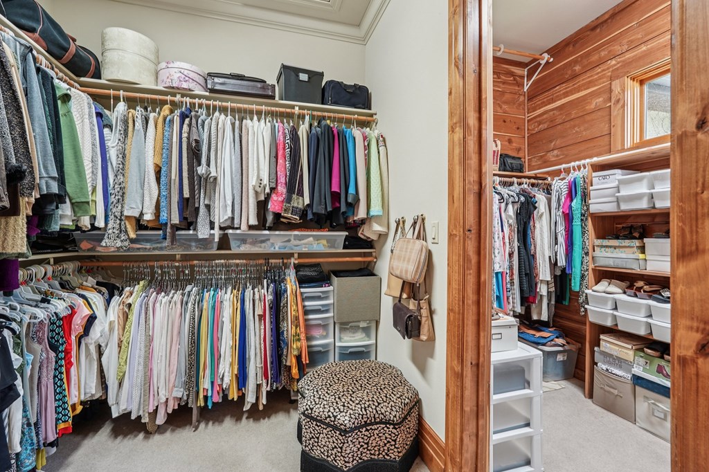 2121 Landmark Kerrville, TX 78028 - Photo 61 of 108 a view of walk in closet with clothes and shoes
