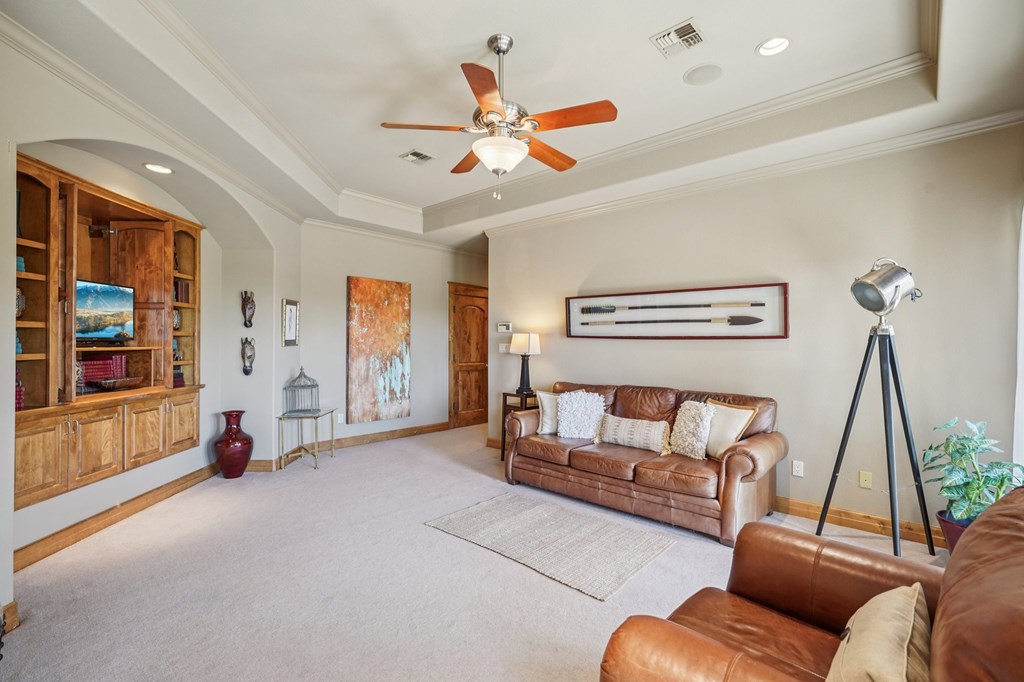 2121 Landmark Kerrville, TX 78028 - Photo 66 of 108 a living room with furniture a ceiling fan and a window