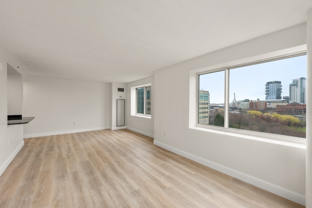 8 Museum Way, Unit 1006 Cambridge, MA 02141 - Photo 6 of 21 a view of an empty room with a window