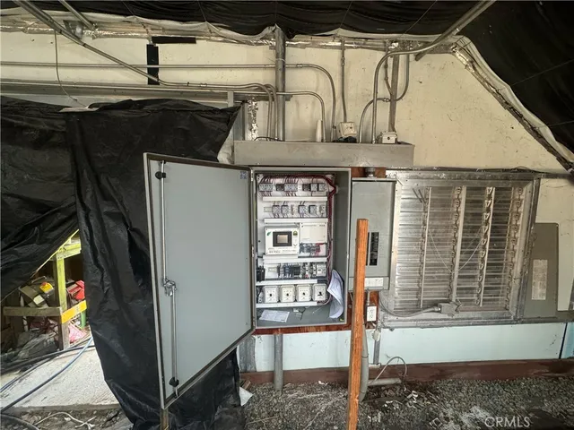 a front view of a house with parking area