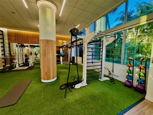 a view of a room with gym equipment