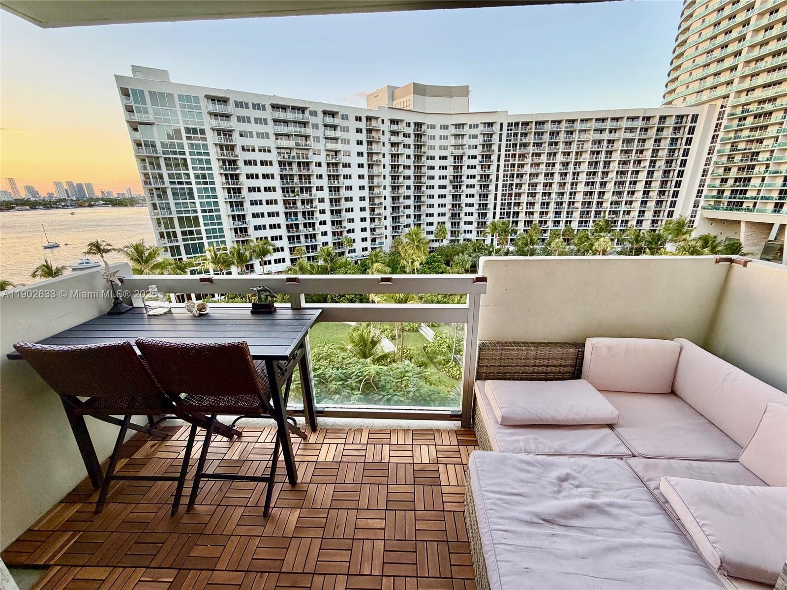 1500 Bay Road, Unit 846S Miami Beach, FL 33139 - Photo 5 of 40 a terrace with outdoor seating and city view