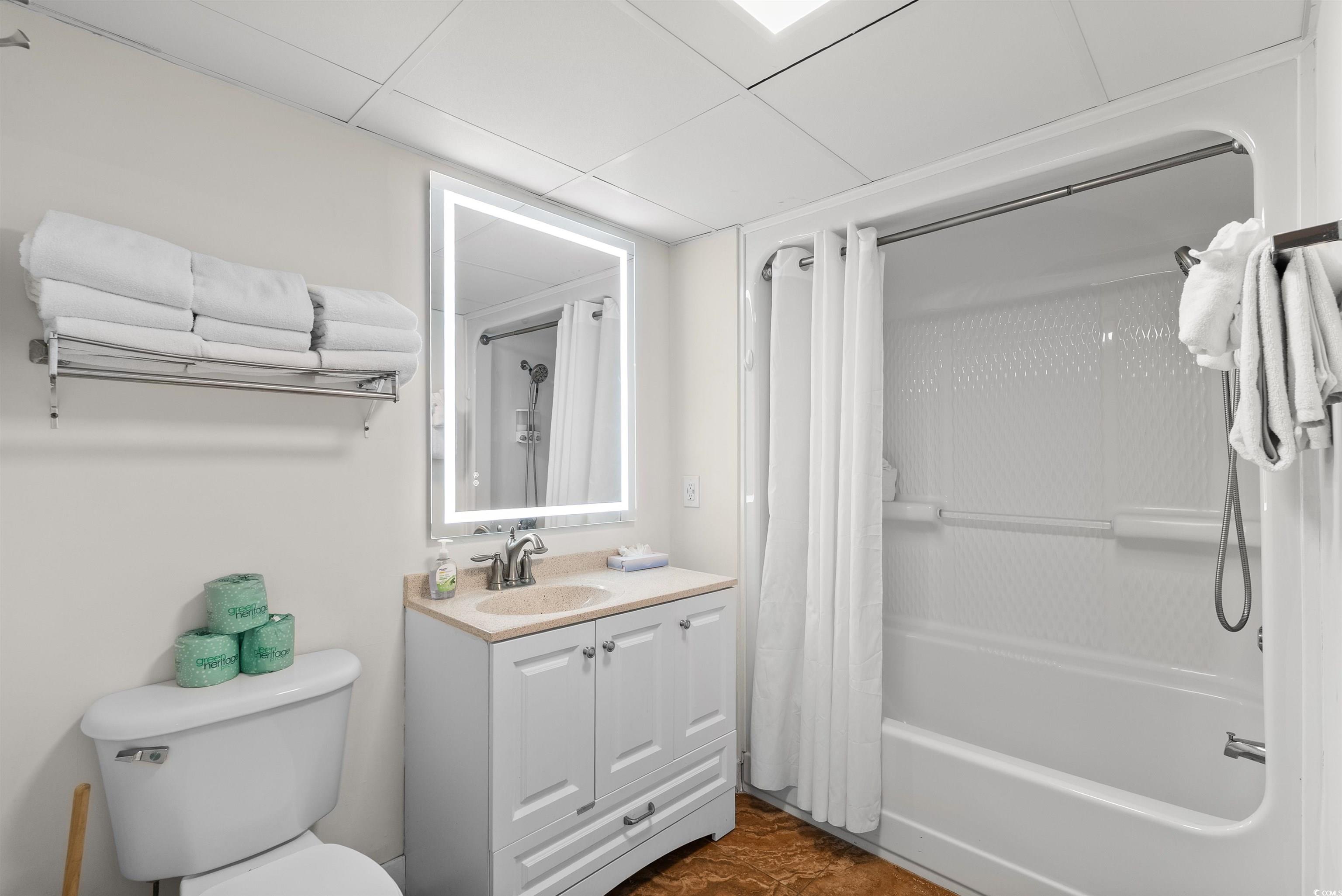 205 74th Avenue North, Unit 1908 Myrtle Beach, SC 29572 - Photo 32 of 39 Full bathroom featuring shower / tub combo and vanity