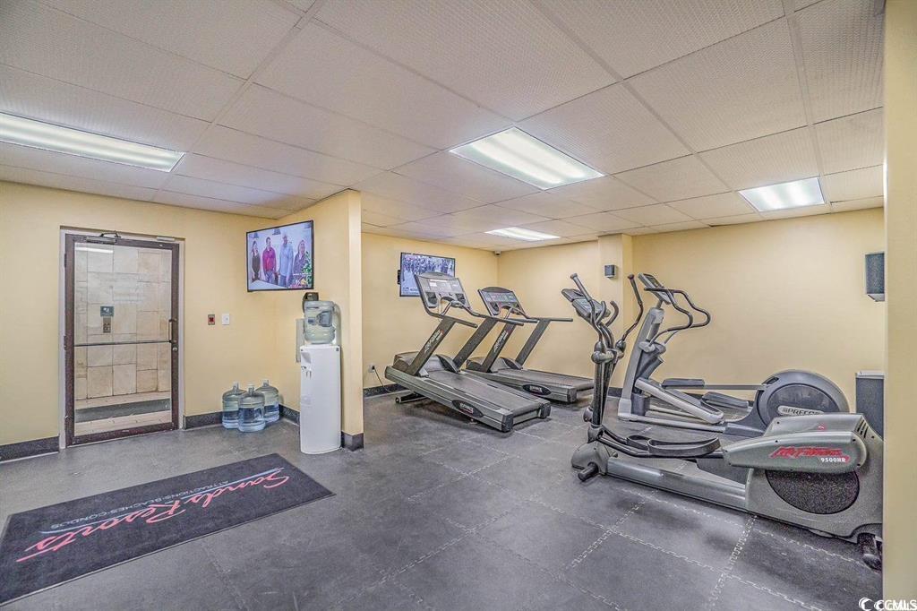 205 74th Avenue North, Unit 1908 Myrtle Beach, SC 29572 - Photo 34 of 39 Exercise room with a paneled ceiling