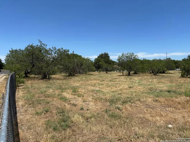 a view of a lake from a yard