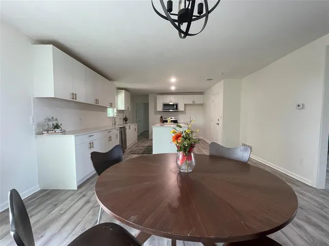 a view of a dining room with furniture
