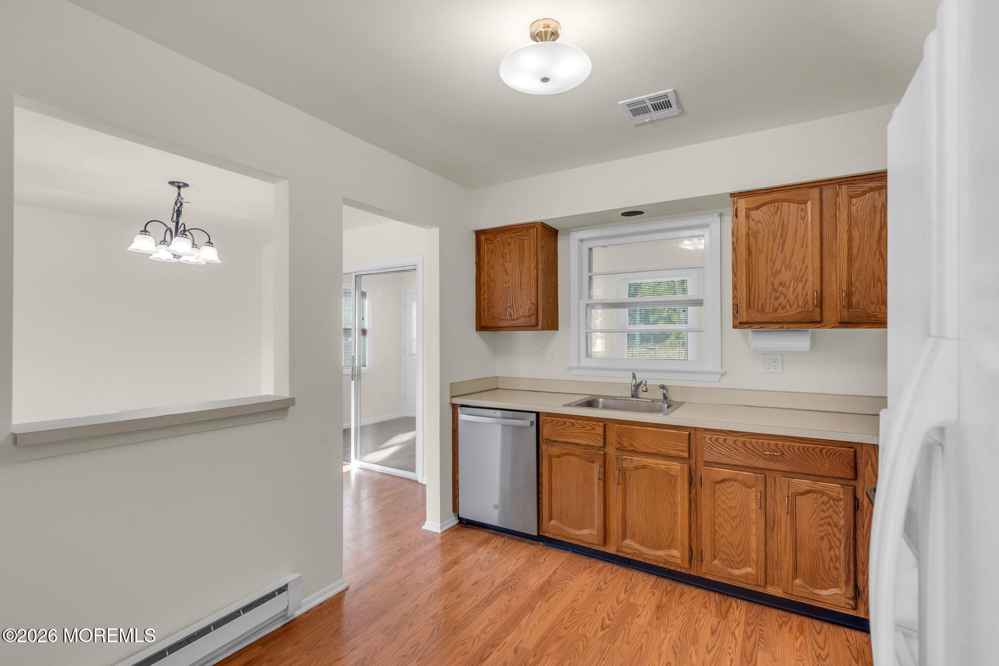 14 Thames Place Brick, NJ 08723 - Photo 16 of 37 a spacious bathroom with a granite countertop sink a light fixture and a mirror