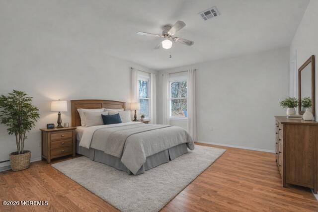 14 Thames Place Brick, NJ 08723 - Photo 21 of 37 a bedroom with a large bed and a chandelier