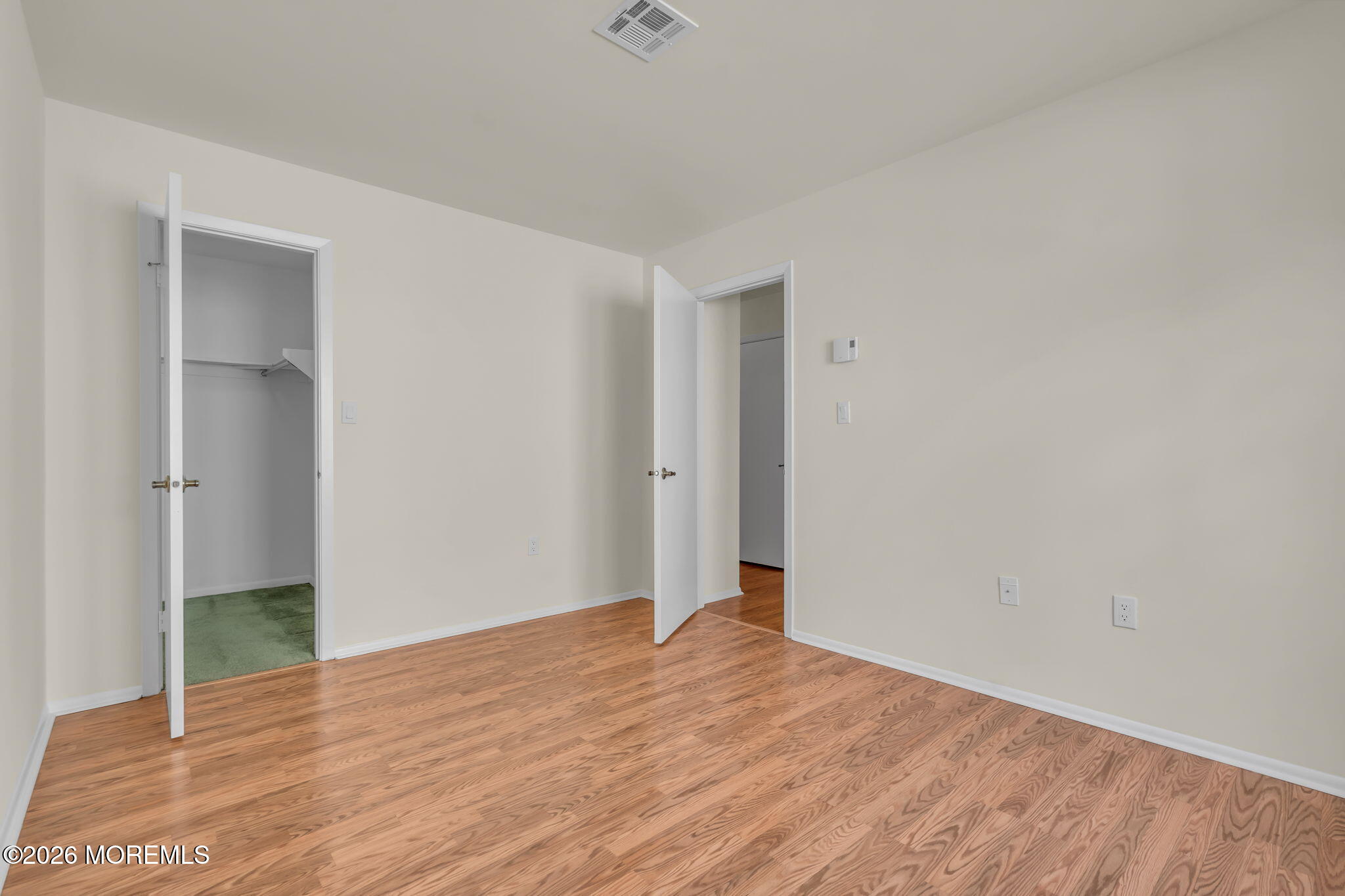 14 Thames Place Brick, NJ 08723 - Photo 24 of 37 a view of an empty room with wooden floor and closet