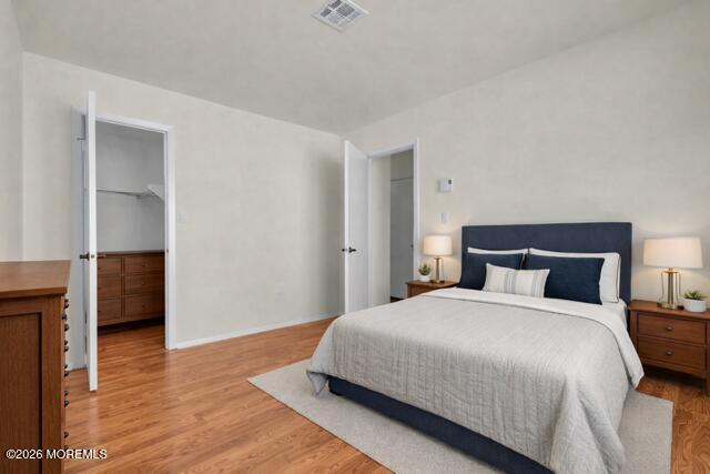 14 Thames Place Brick, NJ 08723 - Photo 25 of 37 a bedroom with a bed and wooden floor