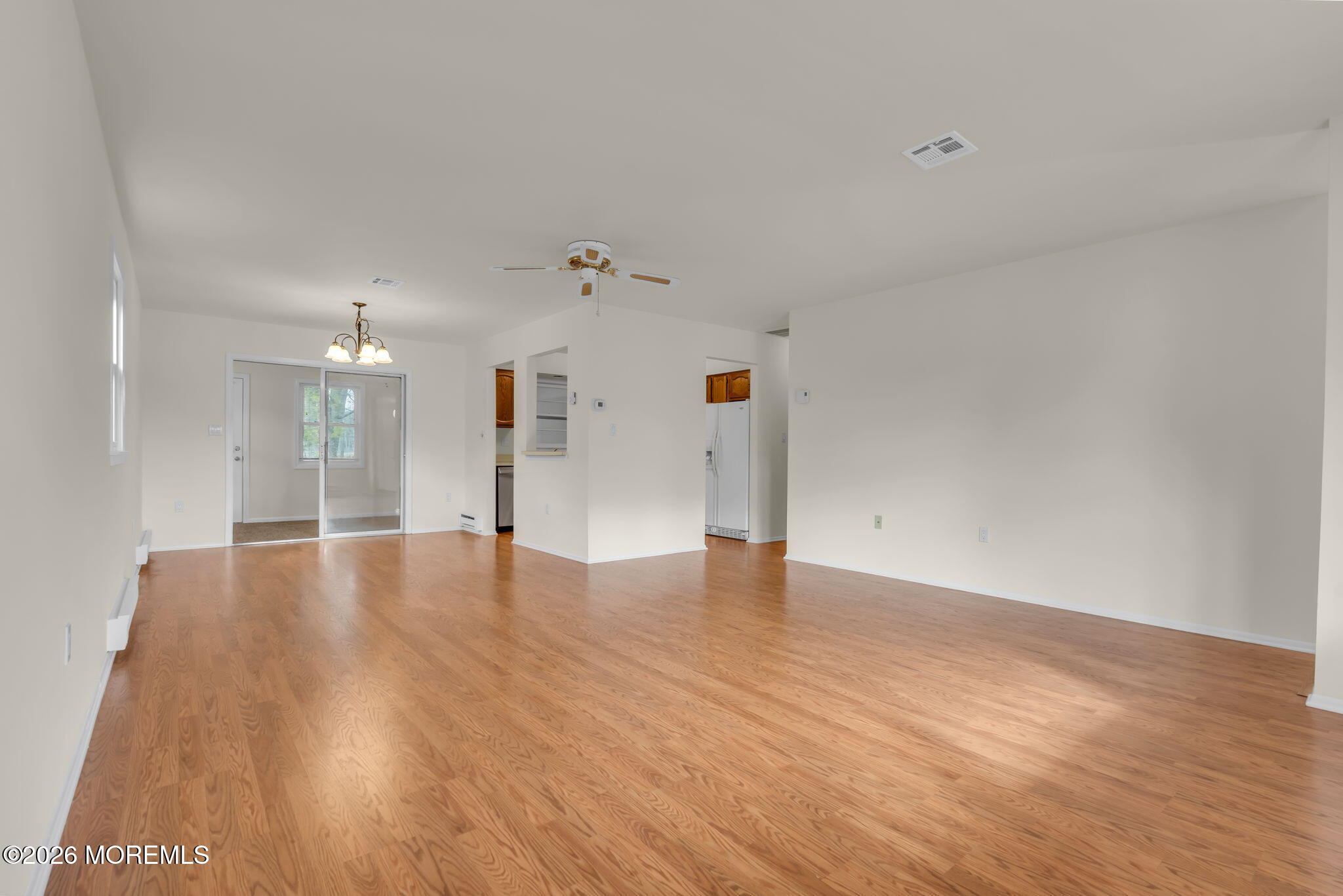 14 Thames Place Brick, NJ 08723 - Photo 9 of 37 a view of an empty room and wooden floor