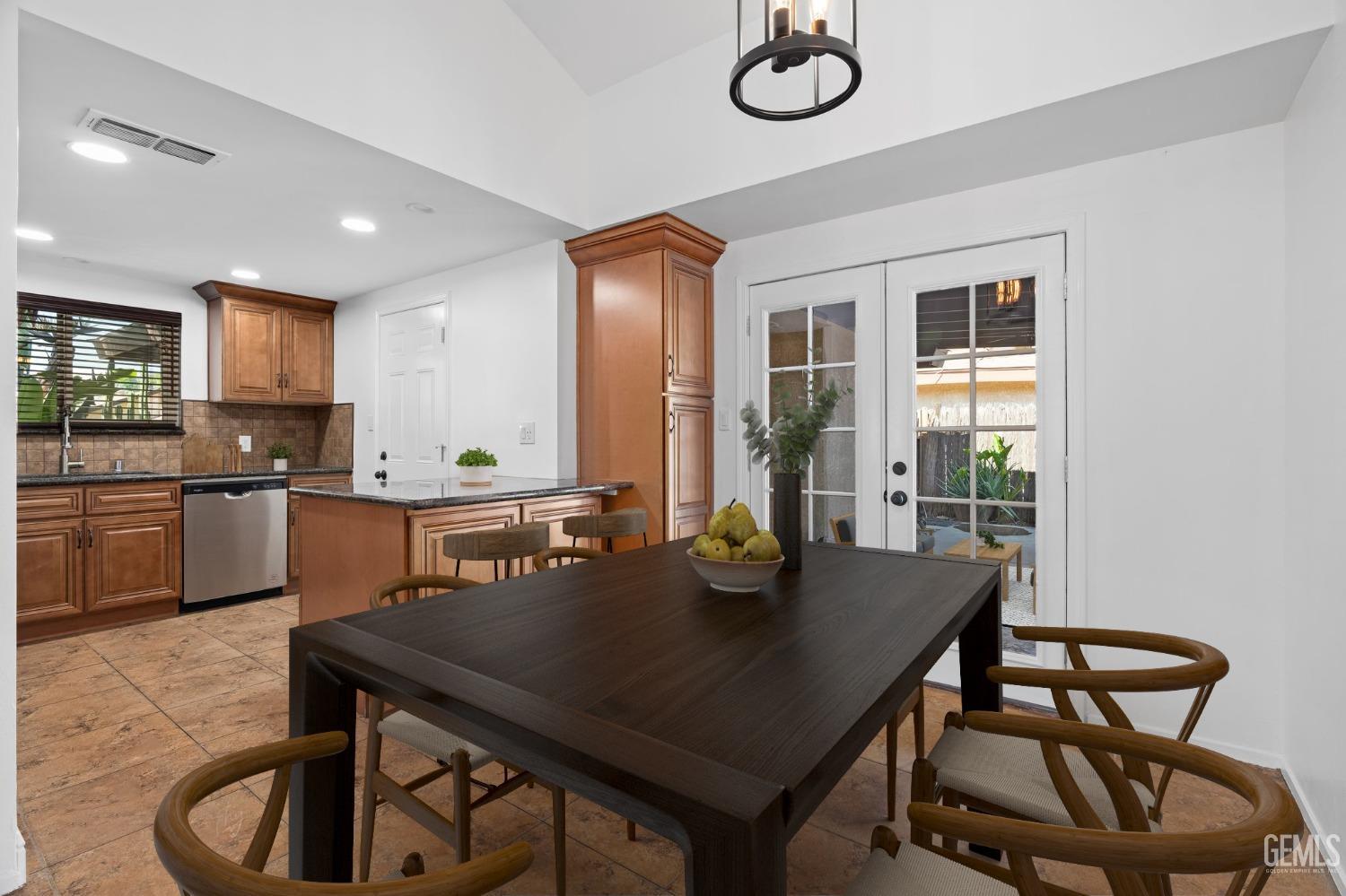 Undisclosed Address Bakersfield, CA 93309 - Photo 11 of 32 a view of a dining room with furniture and a window