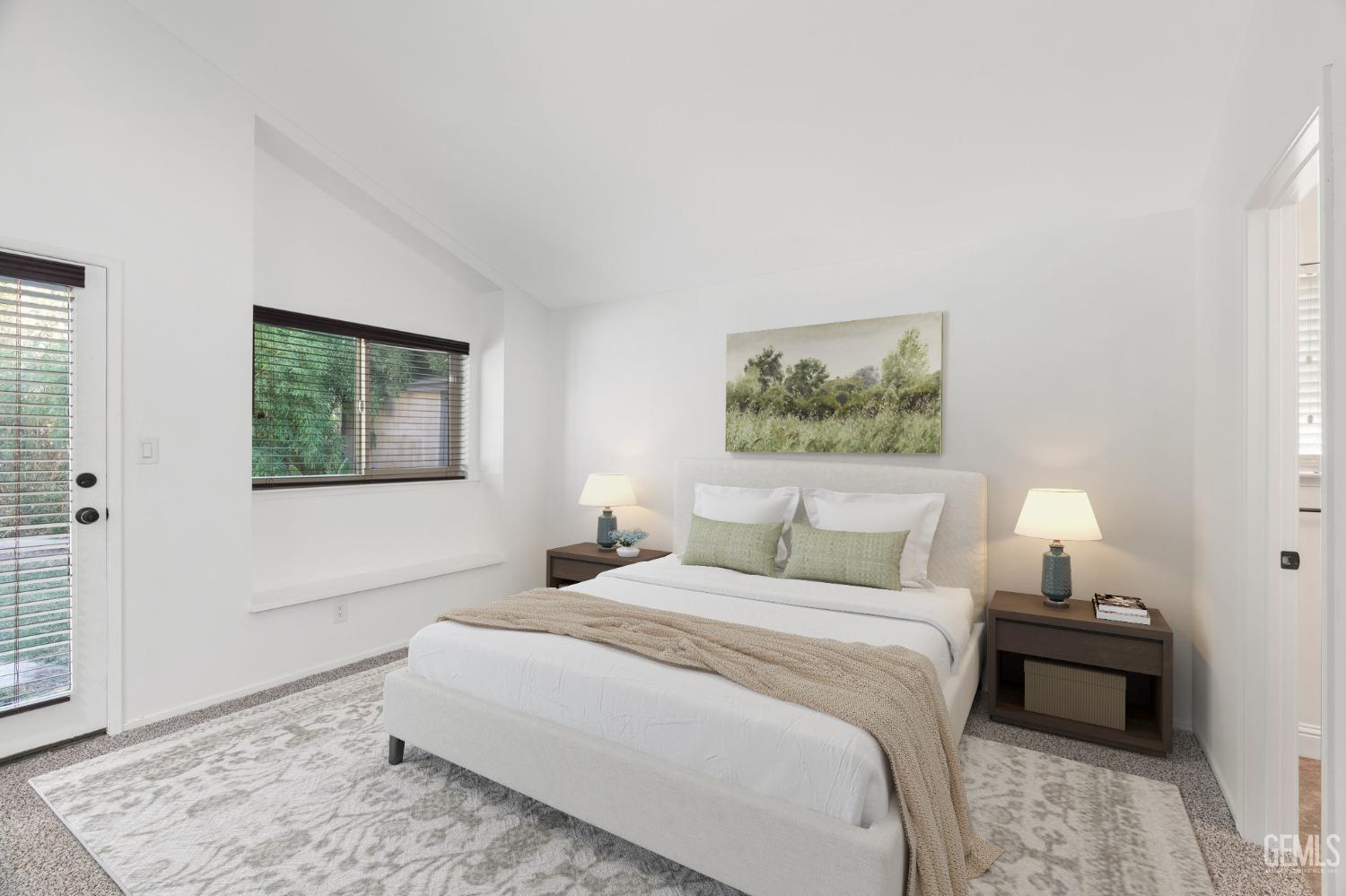 Undisclosed Address Bakersfield, CA 93309 - Photo 20 of 32 a bedroom with a bed and a painting on the wall