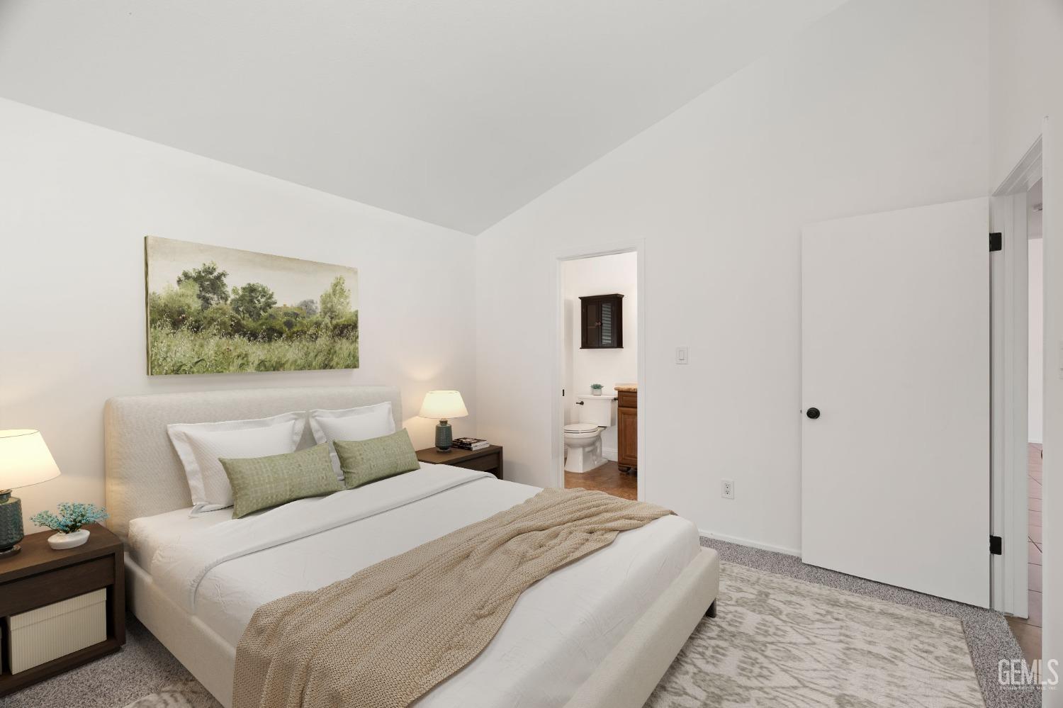 Undisclosed Address Bakersfield, CA 93309 - Photo 21 of 32 a bedroom with a bed and a painting on the wall