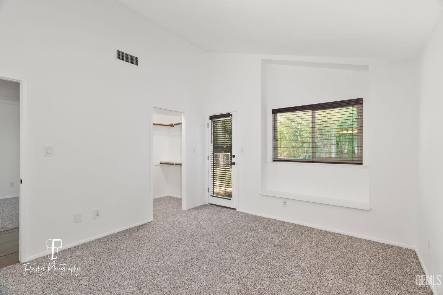 Undisclosed Address Bakersfield, CA 93309 - Photo 22 of 32 a view of an empty room with a window