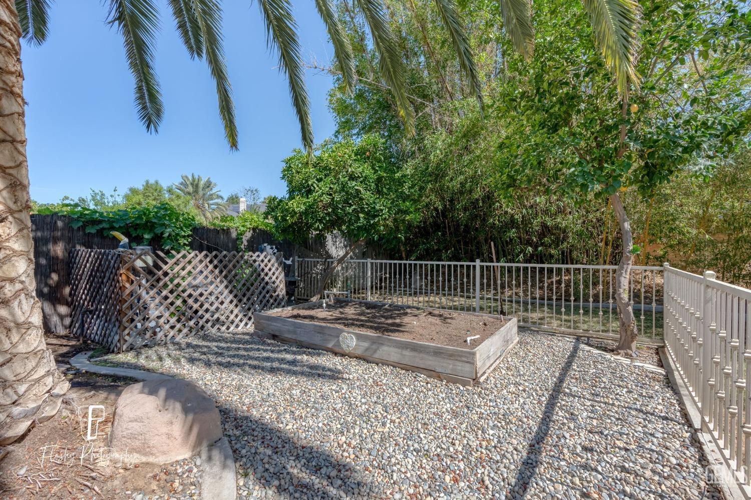 Undisclosed Address Bakersfield, CA 93309 - Photo 29 of 32 a view of backyard with wooden fence