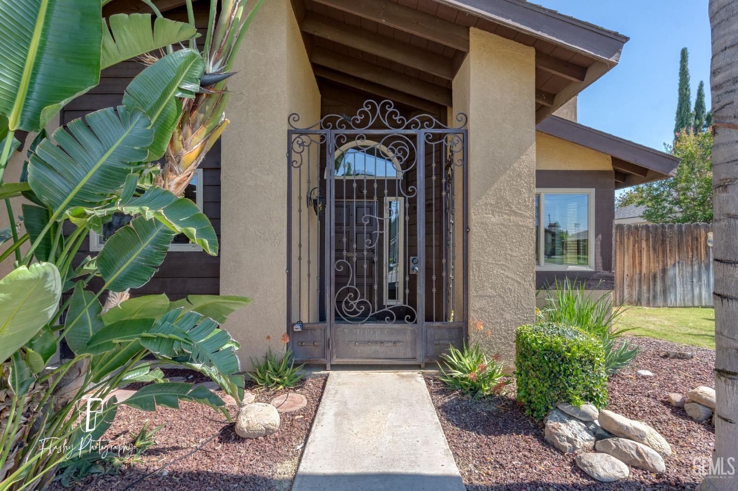 Undisclosed Address Bakersfield, CA 93309 - Photo 4 of 32 a view of a pathway of the house