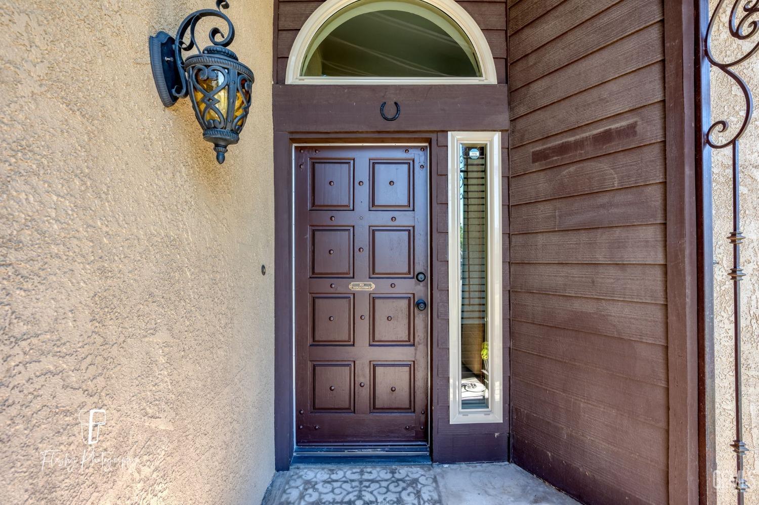 Undisclosed Address Bakersfield, CA 93309 - Photo 5 of 32 a front view of a house with shower