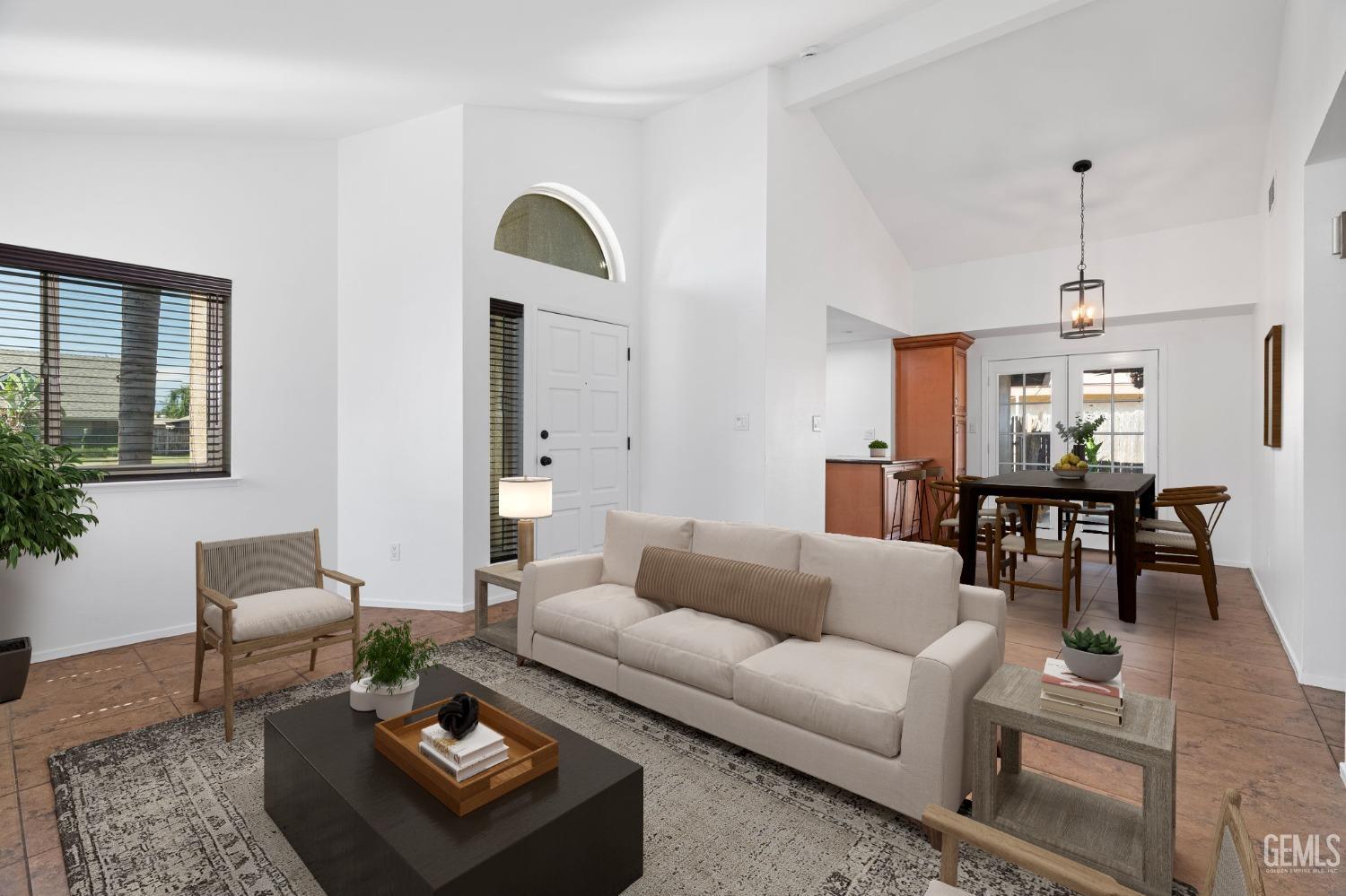Undisclosed Address Bakersfield, CA 93309 - Photo 9 of 32 a living room with furniture and wooden floor