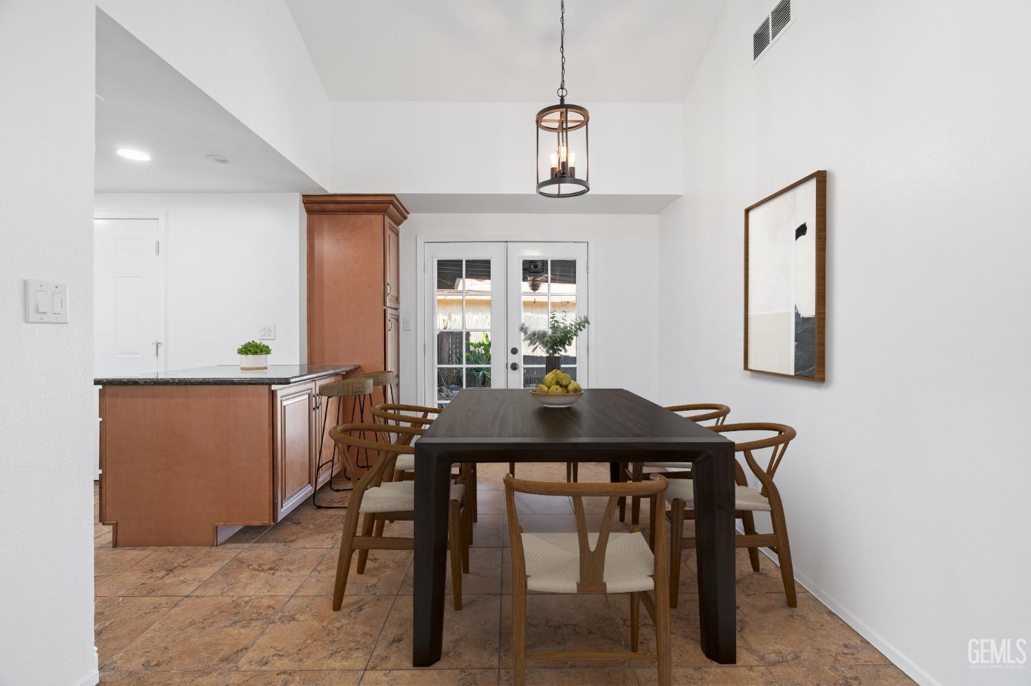 Undisclosed Address Bakersfield, CA 93309 - Photo 10 of 32 a view of a dining room with furniture