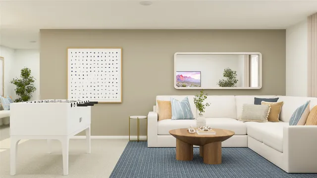 a living room with furniture and a painting