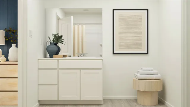 a bathroom with a toilet a sink and a mirror