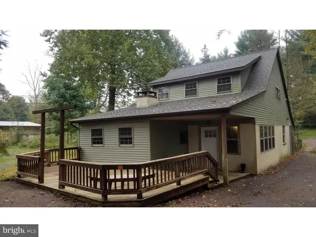 a black and white photo of a house