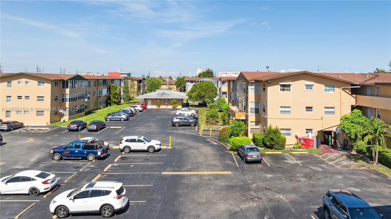 140 Royal Palm Road, Unit 3144 Hialeah Gardens, FL 33016 - Photo 3 of 23 a car parked on the side of the road