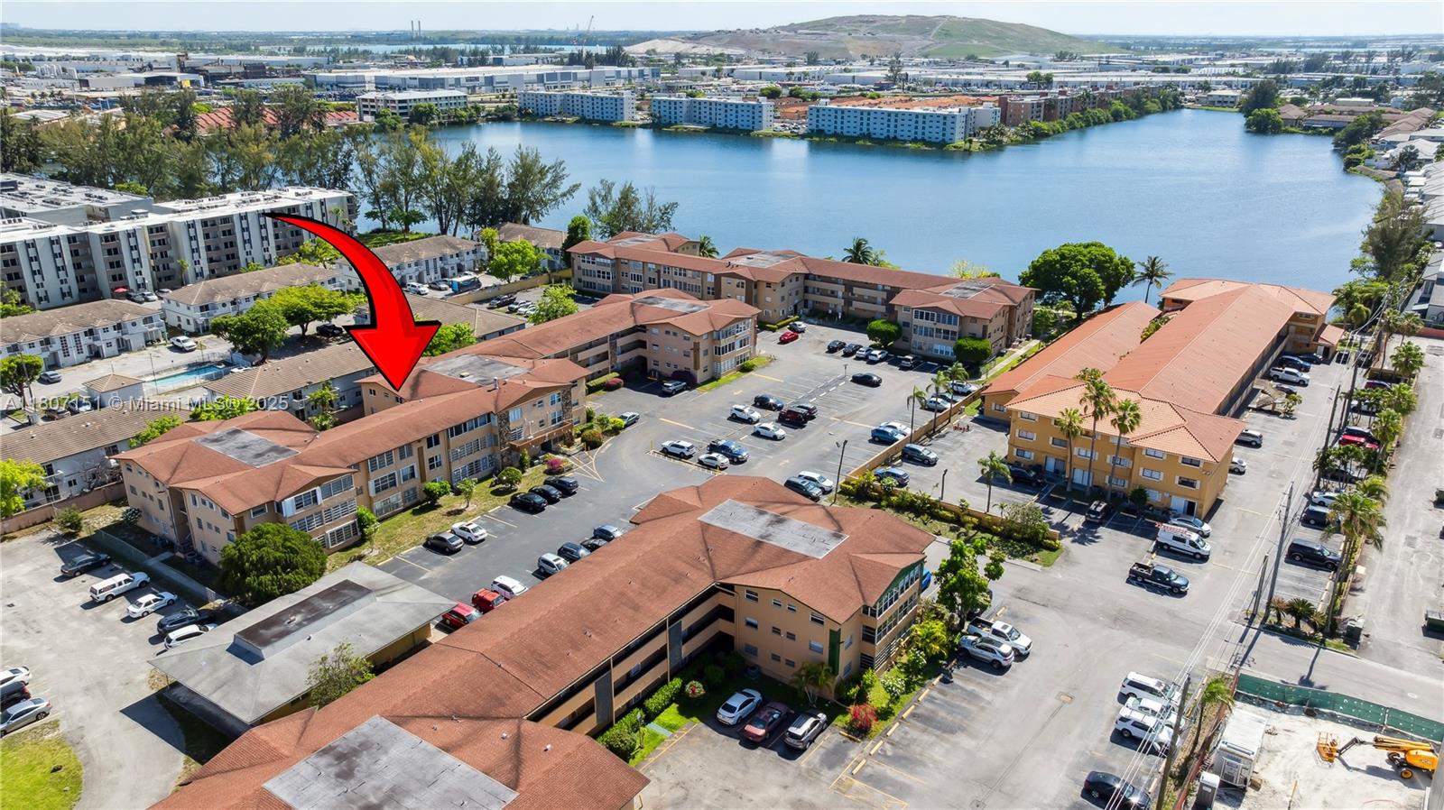 140 Royal Palm Road, Unit 3144 Hialeah Gardens, FL 33016 - Photo 5 of 23 an aerial view of a house with outdoor space and lake view