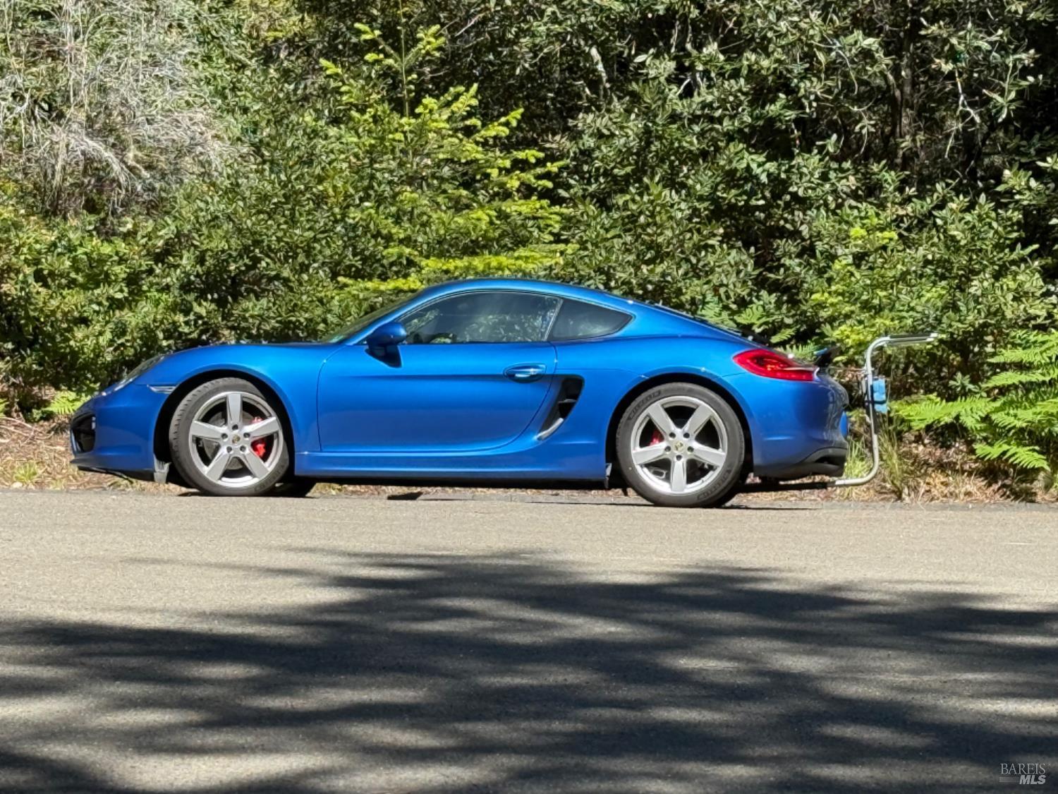 369 Big Tree Close, Unit 27A13 The Sea Ranch, CA 95497 - Photo 10 of 11 a front view of a house with parking space