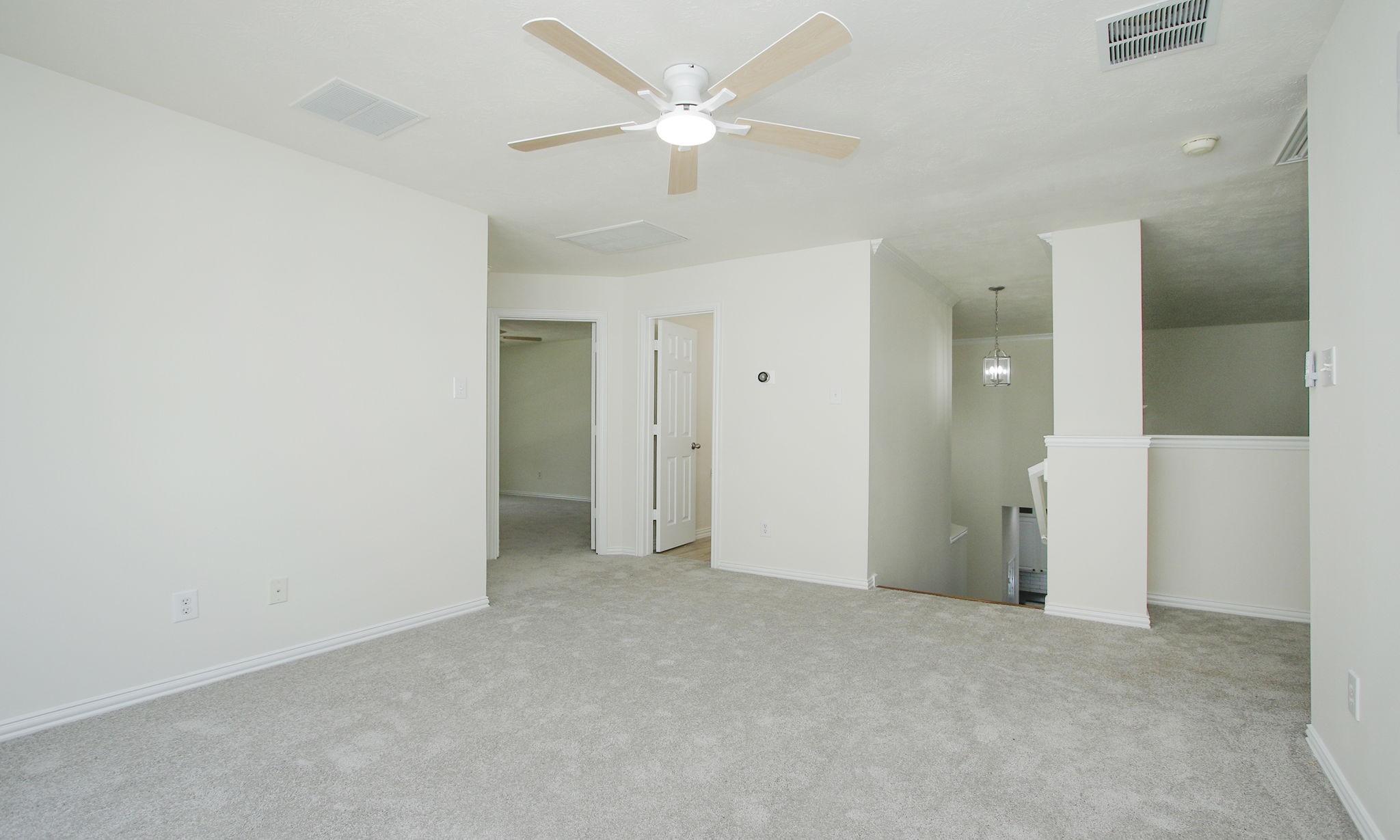 1210 Berwick Manor Court Spring, TX 77379 - Photo 34 of 50 an empty room with fan and entrance
