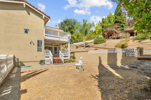 a view of a patio with swimming pool